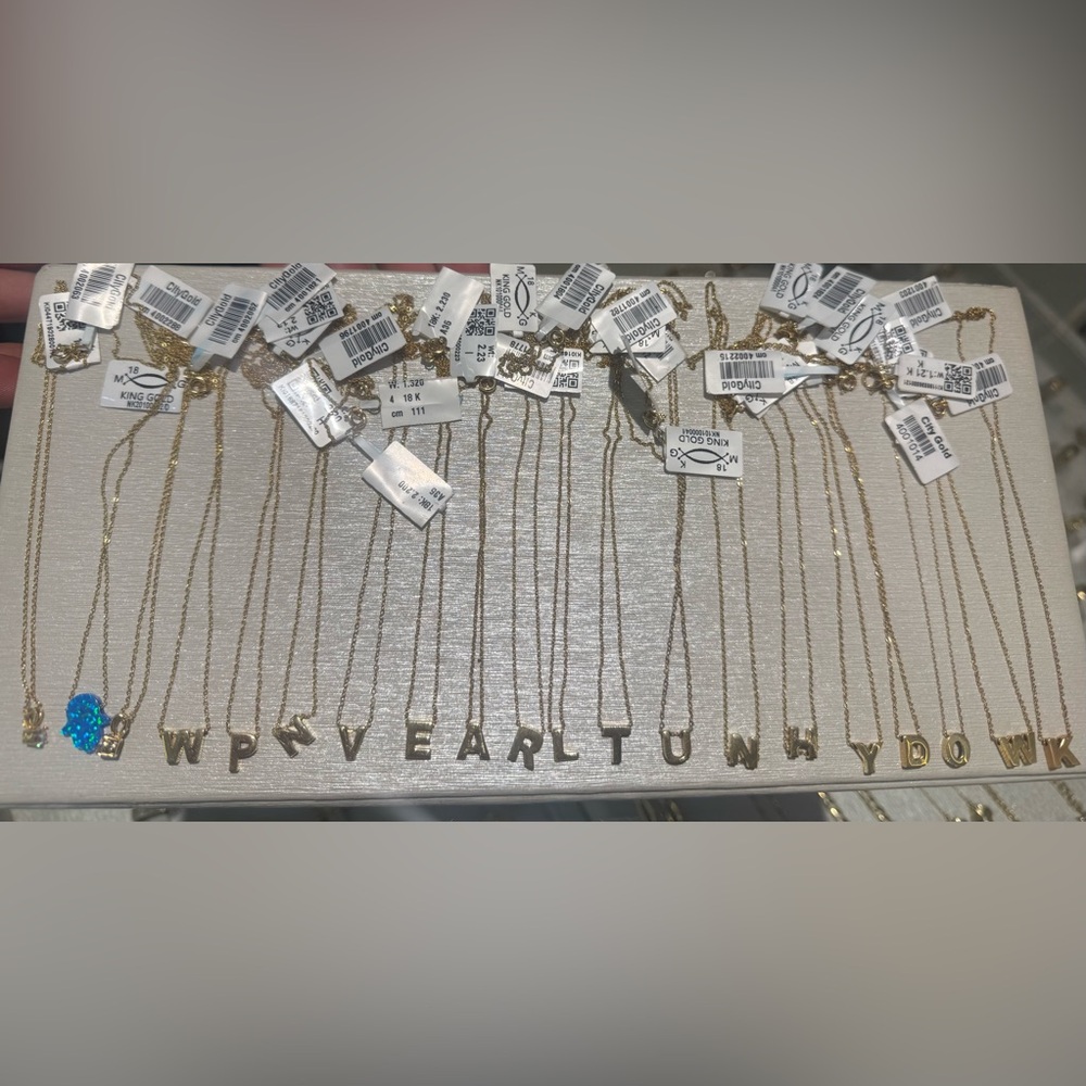 Real gold 18 karat weight 2.5 grams amazing letter necklaces